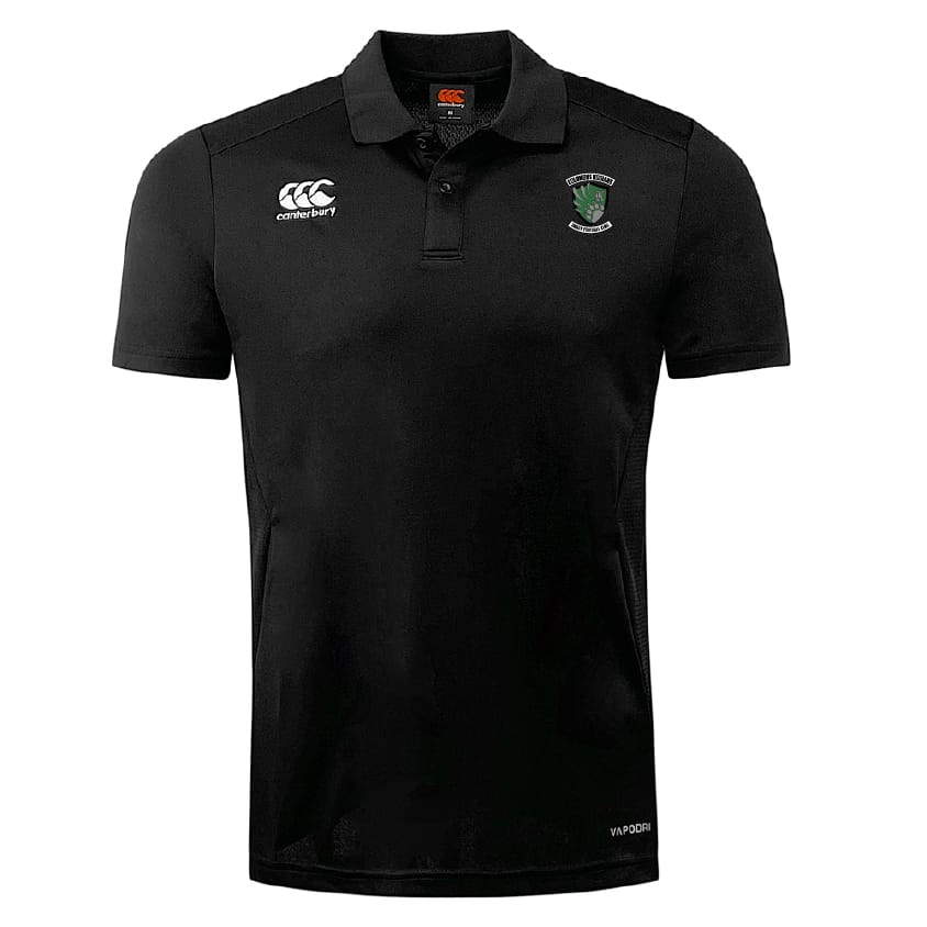 The Columbus Kodiaks Full Color Logo Club Dry Polo by EMB Canterbury is a black, short-sleeved polo with a collar, Vapodri Technology, breathable mesh panels, the Canterbury logo on the right chest, and a green crest on the left.