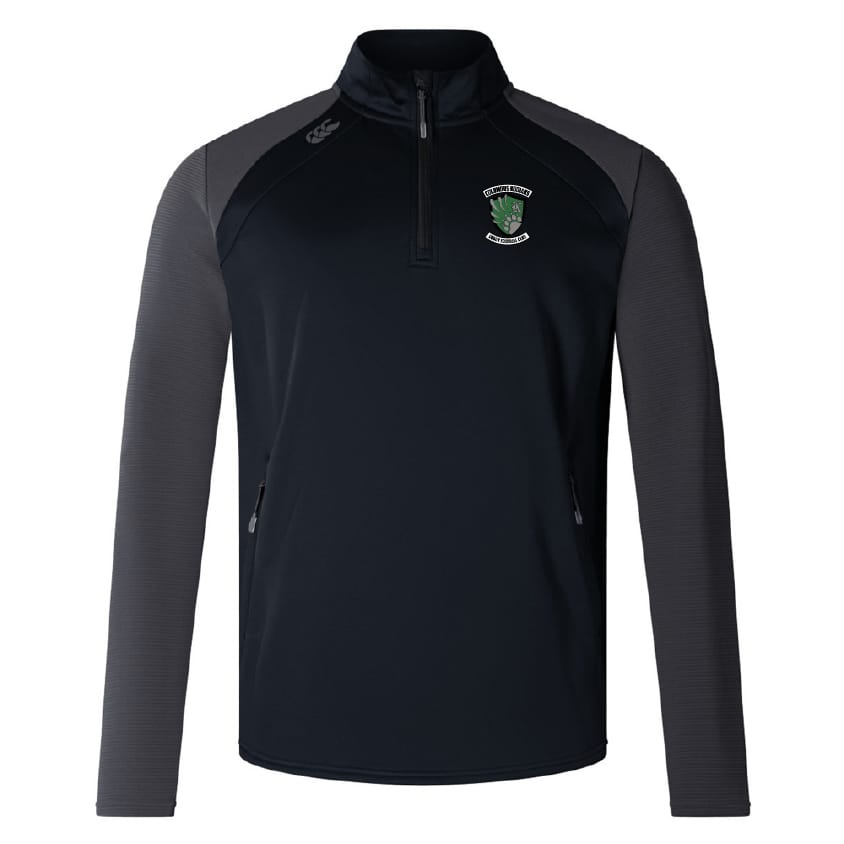 The Columbus Kodiaks Full Color Logo Elite First Layer by EMB Canterbury is a black and dark gray quarter-zip long-sleeve top with VapoDri technology, two zippered pockets, and the team's full color logo on the left chest.