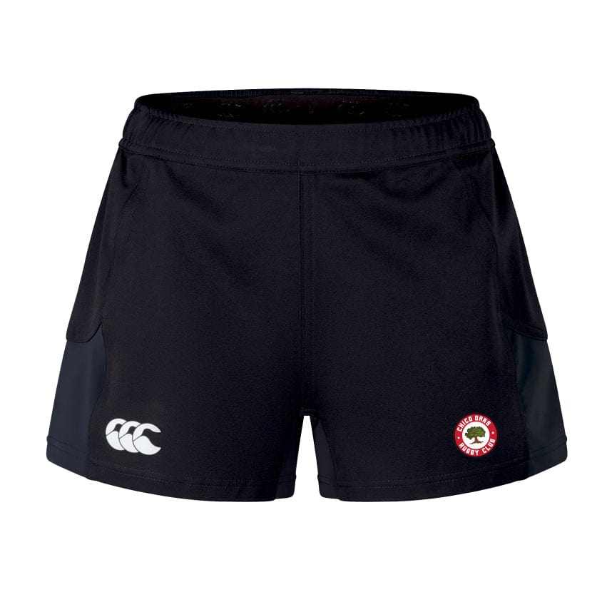 The Chico Oaks Women's Advantage Short 2.0 by EMB Canterbury combines performance and sustainability using recycled materials, with a white logo on the left and a red/white circular emblem on the right.