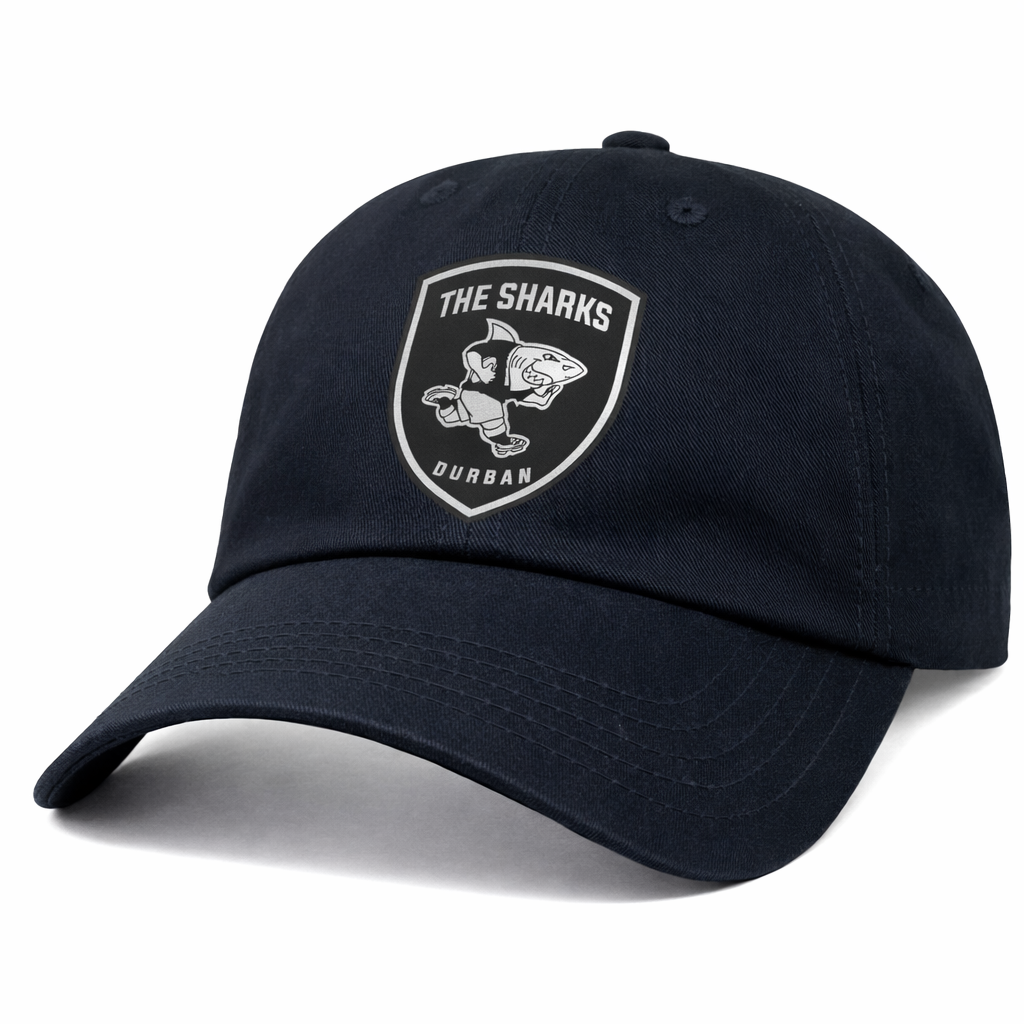 The Sharks Crest Cotton Twill Dad Cap by EMB S&S Activewear features a navy blue design with a front patch displaying "The Sharks Durban" and shark logo—ideal for South Africa rugby fans.