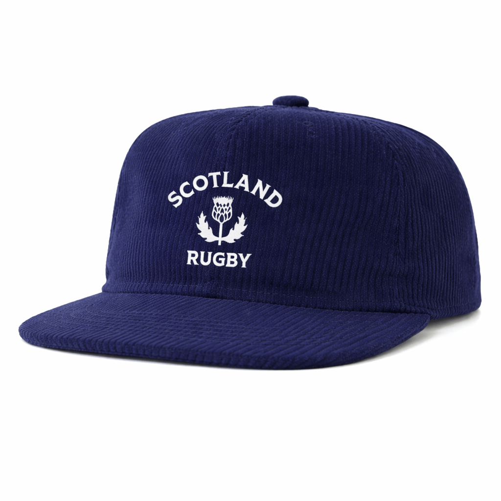 The EMB Weld Nations of Rugby Scotland Corduroy Field Trip Cap features navy blue corduroy, a flat brim, and "Scotland Rugby" with a thistle emblem embroidered on the front—perfect for Scotland Rugby fans.