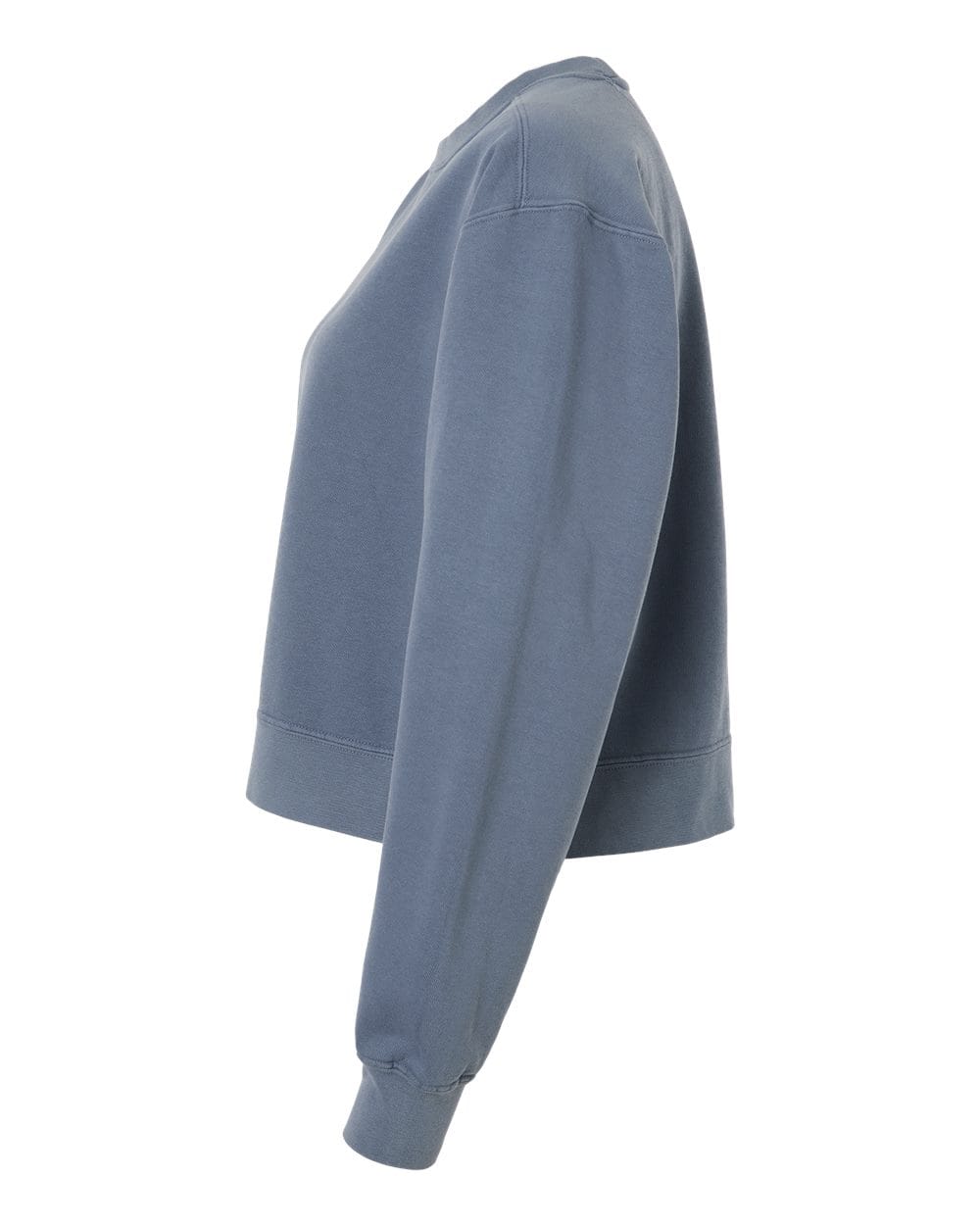 The EMB S&S Activewear Women's USA Rugby Heritage Mid-Length Crewneck Sweatshirt in blue features ribbed cuffs and hem, and is crafted from heritage fleece for classic comfort. Shown from the side.