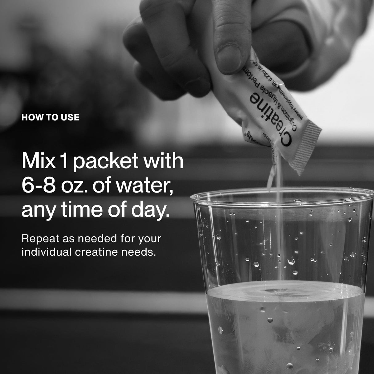 A hand pours a Momentous Creatine 15-Travel Pack into water, following instructions to mix one packet with 6–8 oz. of water anytime for muscle recovery.
