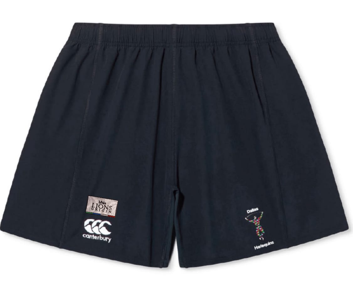 The Dallas Harlequins Lions Origin Yokohama Short by EMB Canterbury is a black athletic short featuring the Canterbury logo, a "Lions" patch, and a multicolored Dallas Harlequins emblem, inspired by the classic Rugby World Cup Yokohama Short.