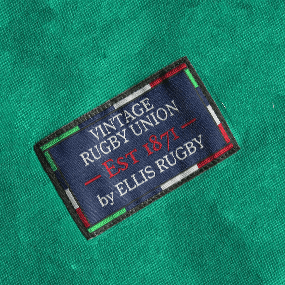 A close-up of the label on a green Ellis Rugby shirt, inspired by the Vintage Irish rugby jerseys. It reads "Vintage Rugby Union EST 1871 by Ellis Rugby," capturing the essence of Ireland's 1948 Grand Slam victories.