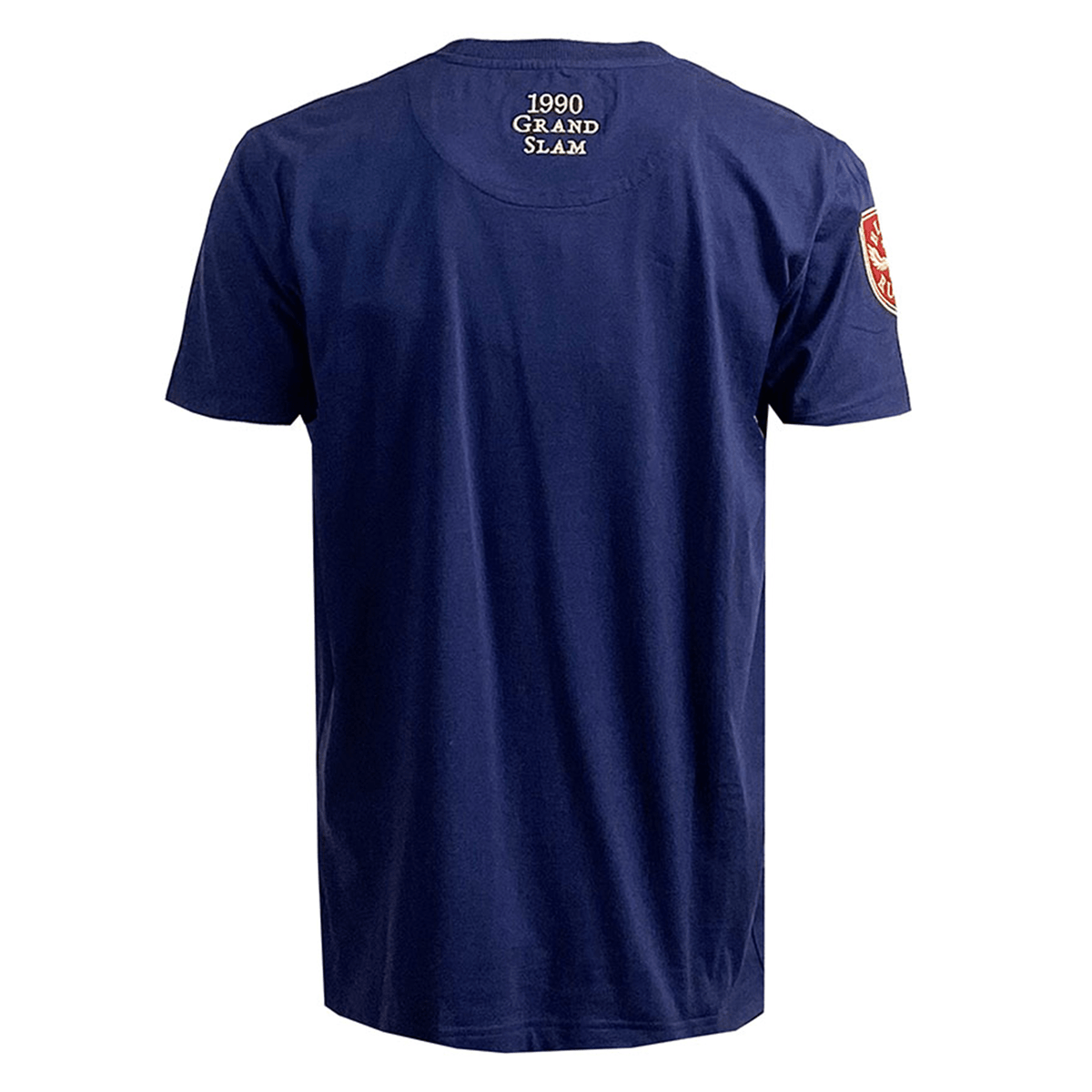 The Ellis Rugby Scotland Rugby 1990 Grand Slam Shirt is a navy blue T-shirt with "1990 Grand Slam" on the upper back and a shield emblem on the right sleeve, capturing the essence of Scottish rugby.