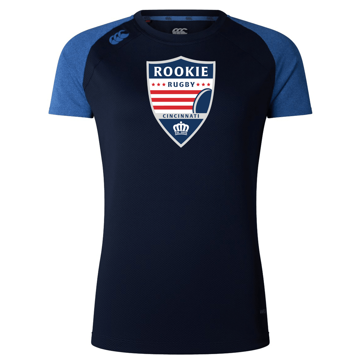 A navy blue sports jersey with short sleeves and blue shoulder patches. The front features a crest that reads "Rookie Rugby Cincinnati" with red stripes and a rugby ball graphic. Made from lightweight fabric, this Cincinnati Rookie Rugby Women's Elite Training Tee by Canterbury ensures comfort and performance for athletes.