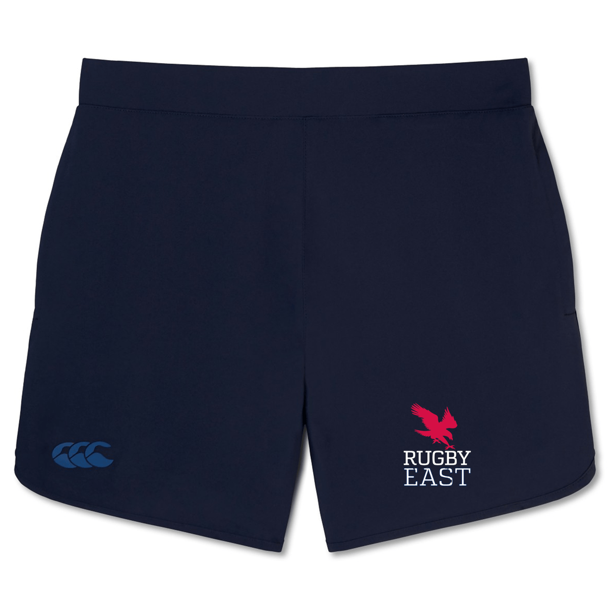Navy blue Rugby East Conference Elite Woven Short by EMB Canterbury feature a Canterbury logo on the left leg, a red eagle with "RUGBY EAST" text on the right leg, and zippered pockets for added convenience. Designed for lightweight comfort, these shorts are perfect for any rugby enthusiast.