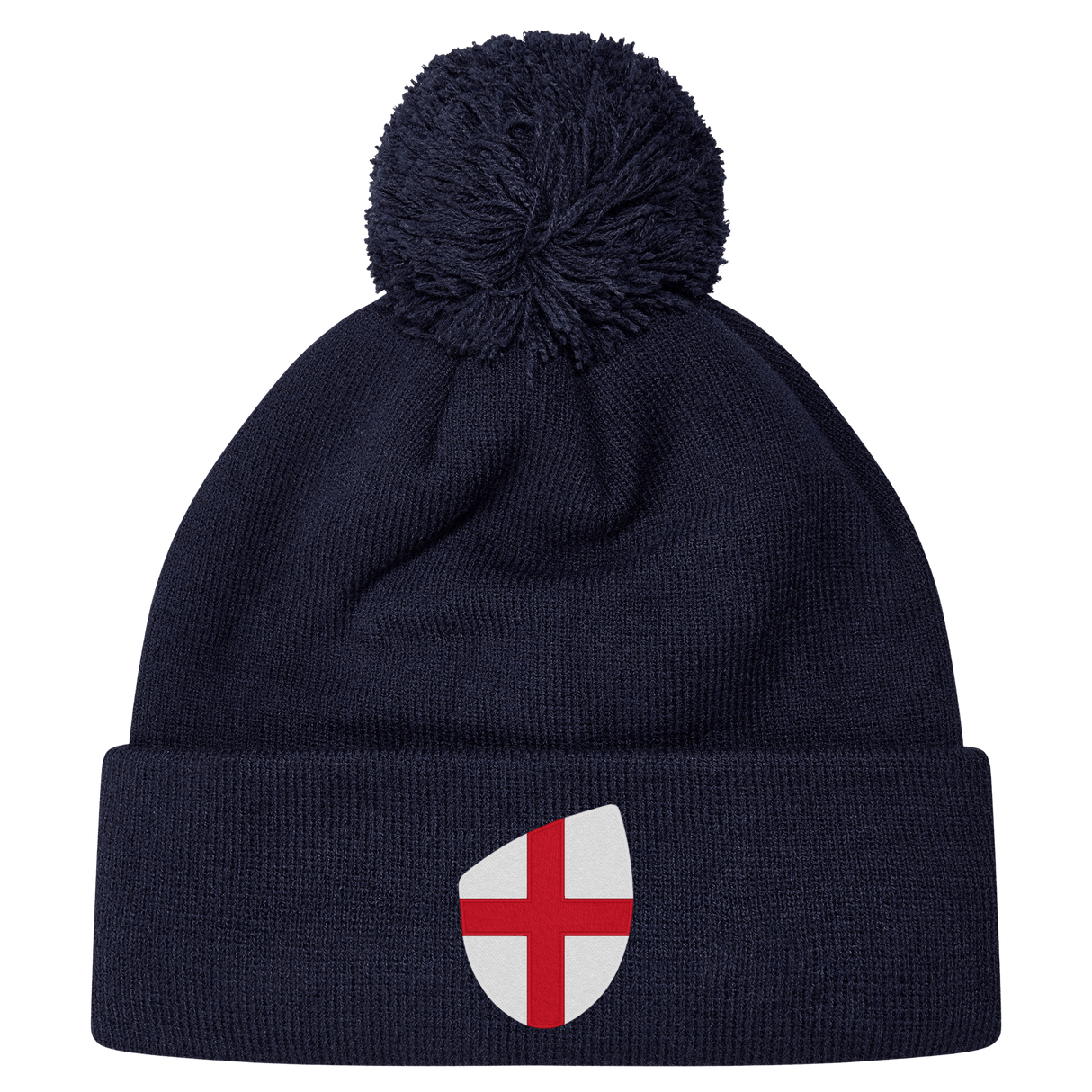 The England Shield Pom Pom Beanie by EMB Canterbury is a navy blue beanie featuring a prominent shield emblem with a red cross on a white background.