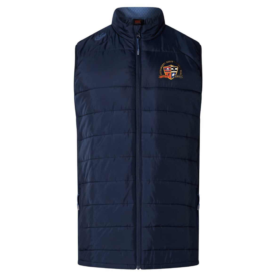 The Sacramento Rugby Football Club Elite Microlite Gilet by EMB Canterbury features navy blue quilted insulation, a zip-up front, and an embroidered crest logo on the left chest.