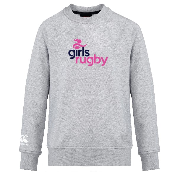 The Girls Rugby Club Crew Sweatshirt by WRS Canterbury is an ultra-soft light grey top with "girls rugby" in pink and navy, a rugby player icon above, and an embroidered CCC logo on the left sleeve.
