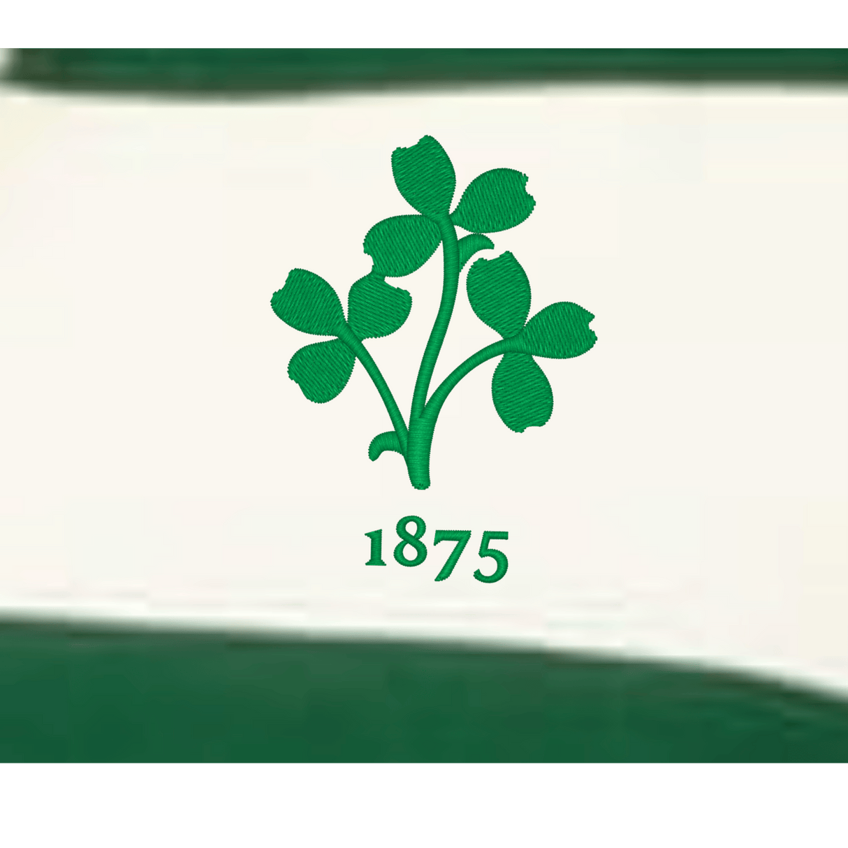 A green shamrock with "1875" beneath it is centered on a white background bordered by green stripes—perfect for fans of the EMB Augusta Women's Vintage Ireland Prep Street Rugby Crop.