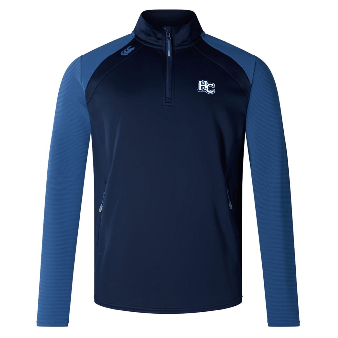 The Holy Cross Elite First Layer by EMB Canterbury is a navy and light blue long-sleeve quarter-zip top with the "HC" logo, side zip pockets, and VapoDri technology for advanced comfort.