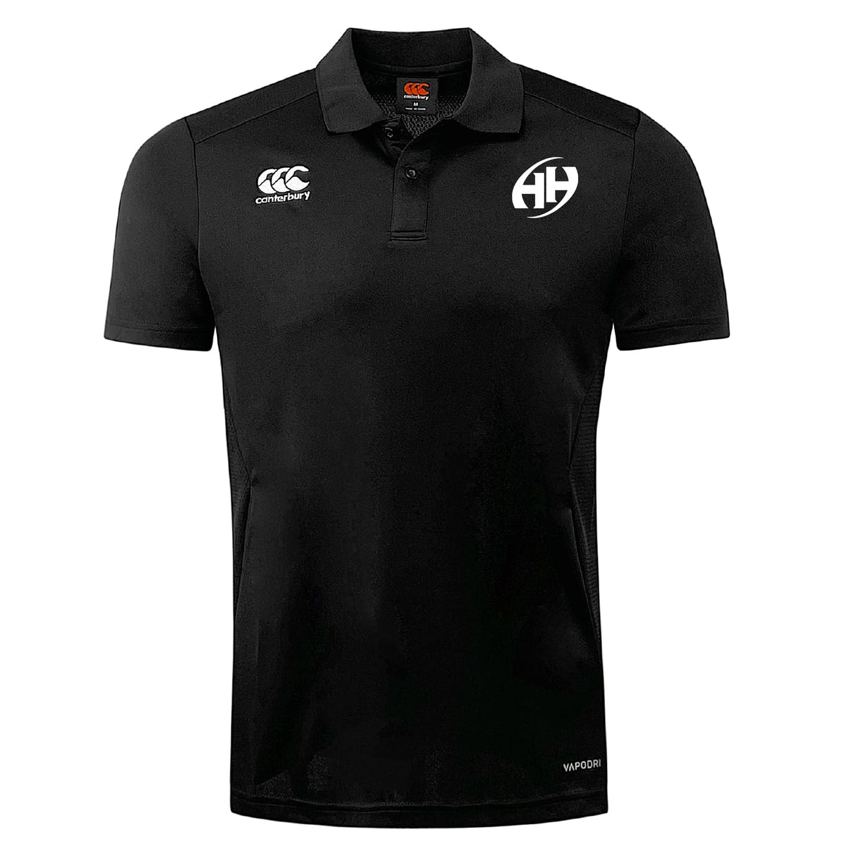 The Clarksville Headhunters Club Dry Polo by EMB Canterbury is a black short-sleeve polo with collar and button placket, featuring Vapodri Technology for moisture-wicking comfort and two chest logos: "Canterbury" and a circular "AH.