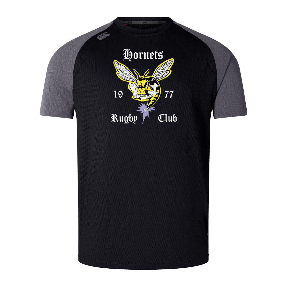 The Hornets Rugby Club Elite Training Tee by Canterbury features black and grey short sleeves, a hornet graphic, "Hornets Rugby Club," and "1977" on the front, made with lightweight Vapodri fabric by WRS Canterbury for comfort on and off the field.