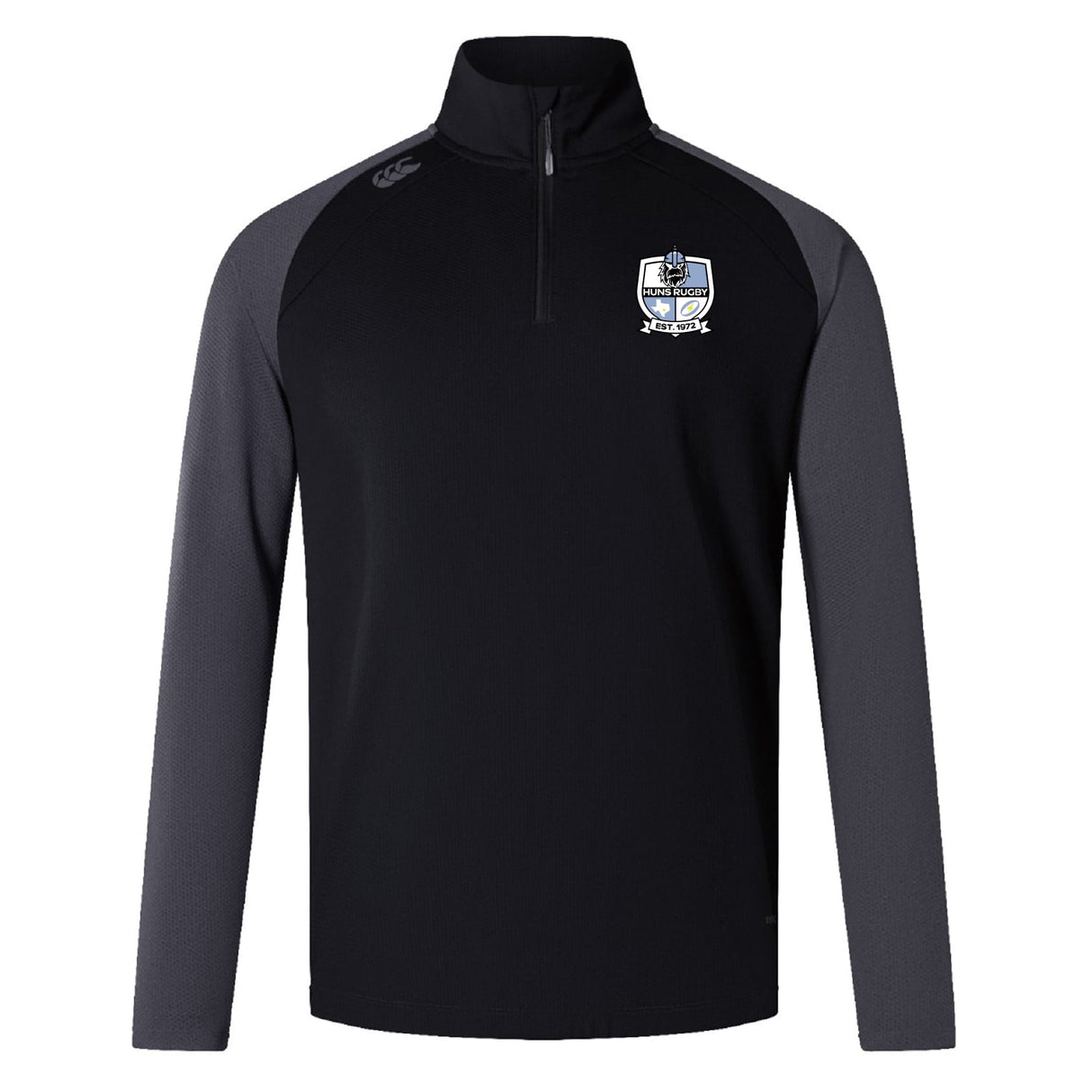 The Austin Huns Rugby Elite First Layer by EMB Canterbury is a black and dark grey long-sleeve quarter-zip pullover with VapoDri tech, crest logo on the left chest, and a small right shoulder logo—perfect as a rugby training top.