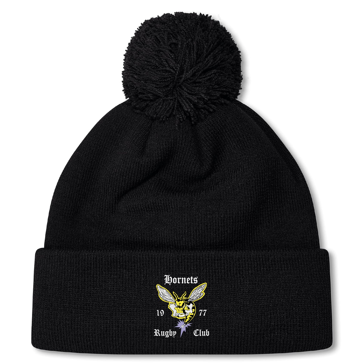 The Hornets Rugby Club Pom Pom Beanie by EMB Canterbury is a black fleece-lined knit hat with a pom-pom and embroidered "Hornets Rugby Club 1977" logo—perfect for rugby fans.