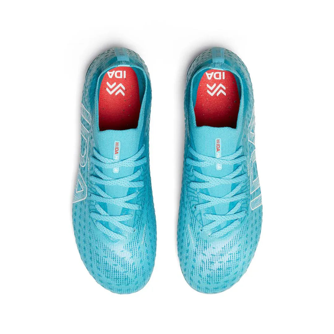 The IDA Sports Ida Women's Helia Pro SG soccer cleats in blue, with red insoles and white logos, are shown from above on a white background—perfect for pro performance, style, and comfort.