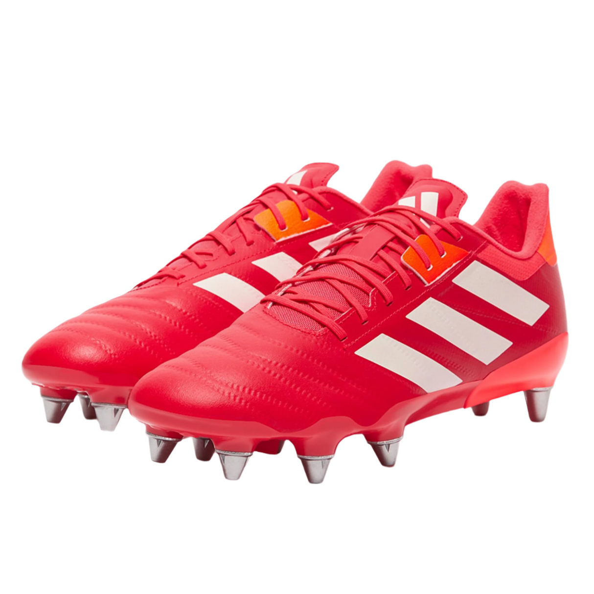 The adidas Kakari RS SG rugby boots in Lucid Red/White/Team Solar Orange feature white stripes, metal studs, and a lightweight design, displayed on a white background.