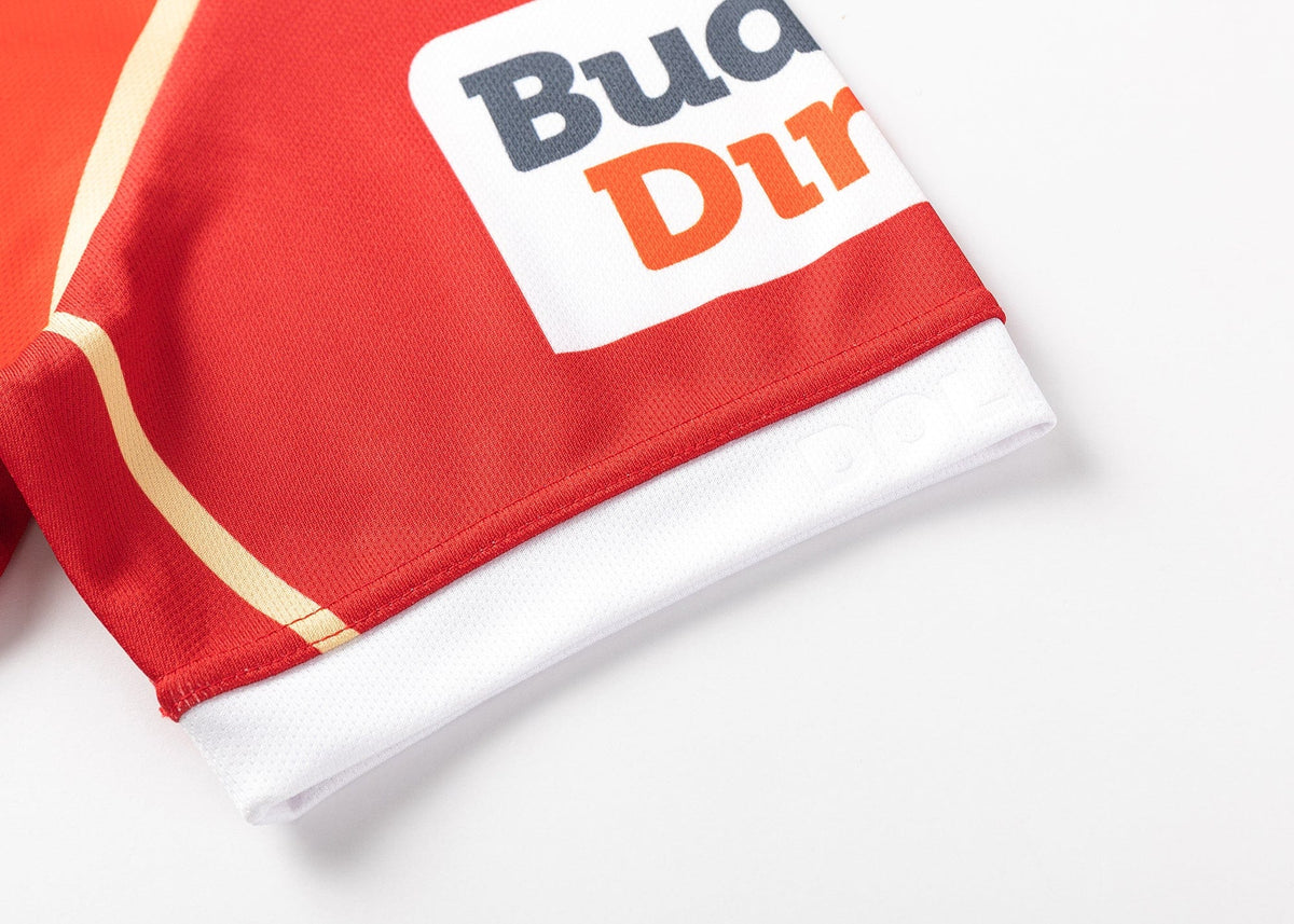 A red and white Dolphins NRL 25/26 Replica Home Jersey by Classic Sportswear, featuring logos and partial text like "Bud" and "Dir", is ideal for any Dolphins NRL fan.