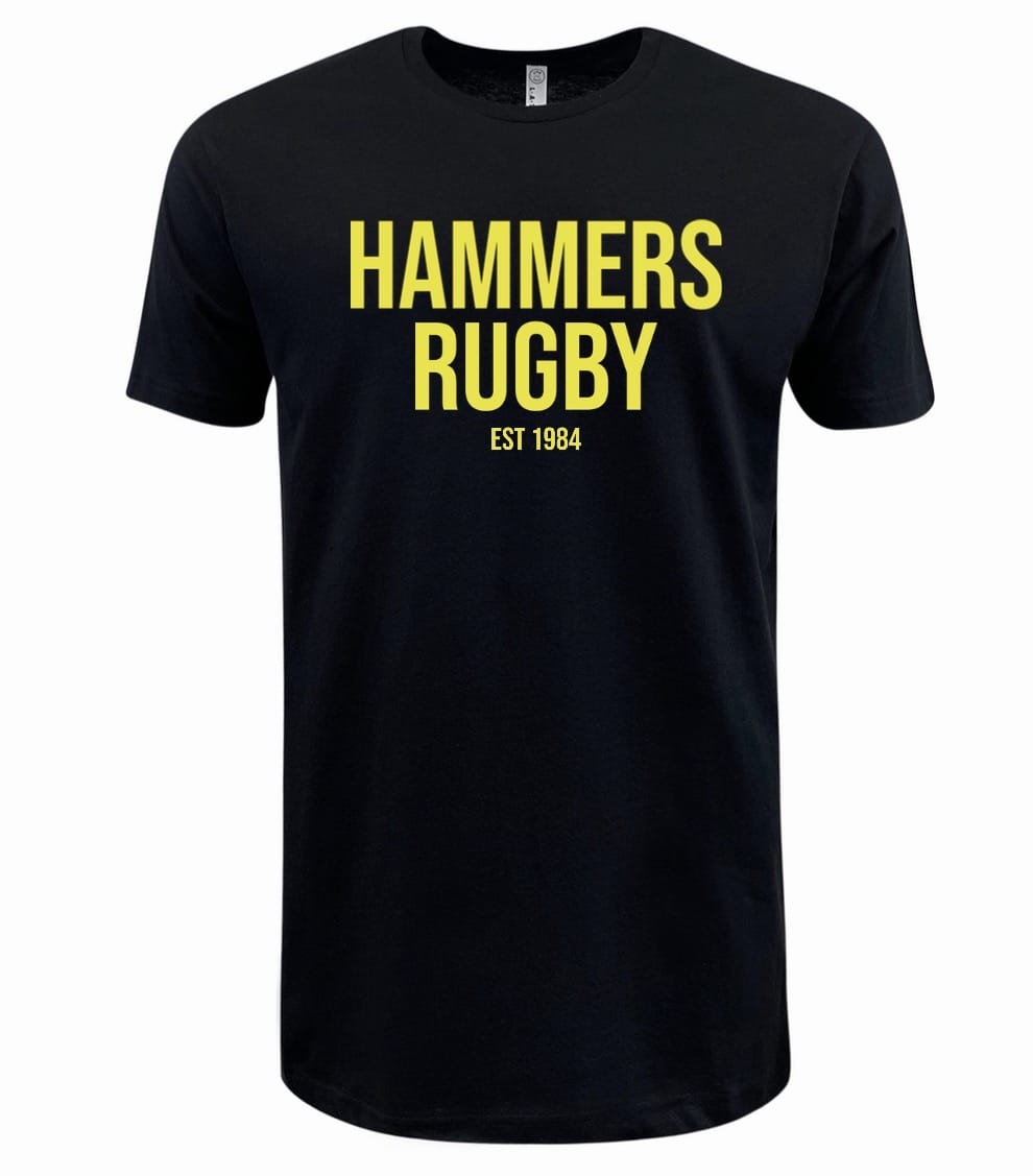 The Montgomery Yellowhammers "Hammers Rugby" Supersoft Tee by WRS LAT is a black unisex cotton t-shirt featuring bold yellow "HAMMERS RUGBY EST 1984" text on the front.