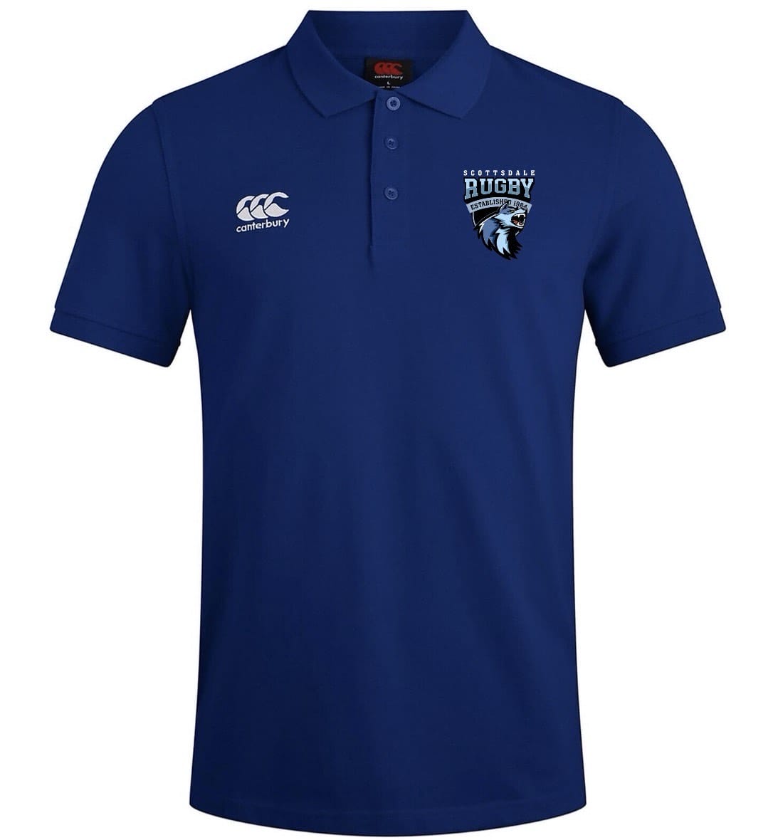 The Scottsdale Rugby Royal Waimak Rugby Polo by EMB Canterbury is a blue men's short-sleeve shirt featuring the Canterbury logo on the right chest and a Scottish Rugby lion head on the left.
