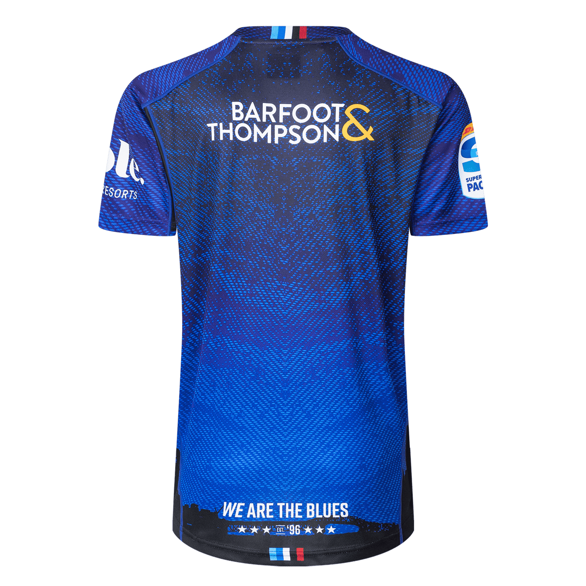 The back of the Blues Super Rugby 25/26 Replica Home Jersey by Classic Sportswear displays "Barfoot & Thompson" prominently. It features logos on both sleeves, and "We Are the Blues" at the bottom, embodying the Blues spirit.