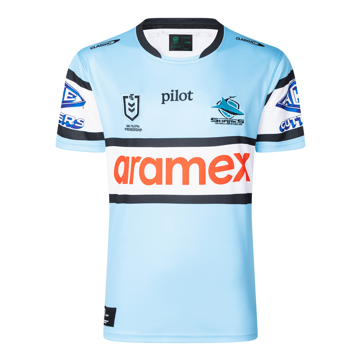 The Sharks NRL 25/26 Replica Home Jersey by Classic Sportswear features a light blue design with black and white striped sleeves, adorned with Pilot, Aramex, and Cronulla Sutherland Sharks logos. A must-have for any Sharks fan.