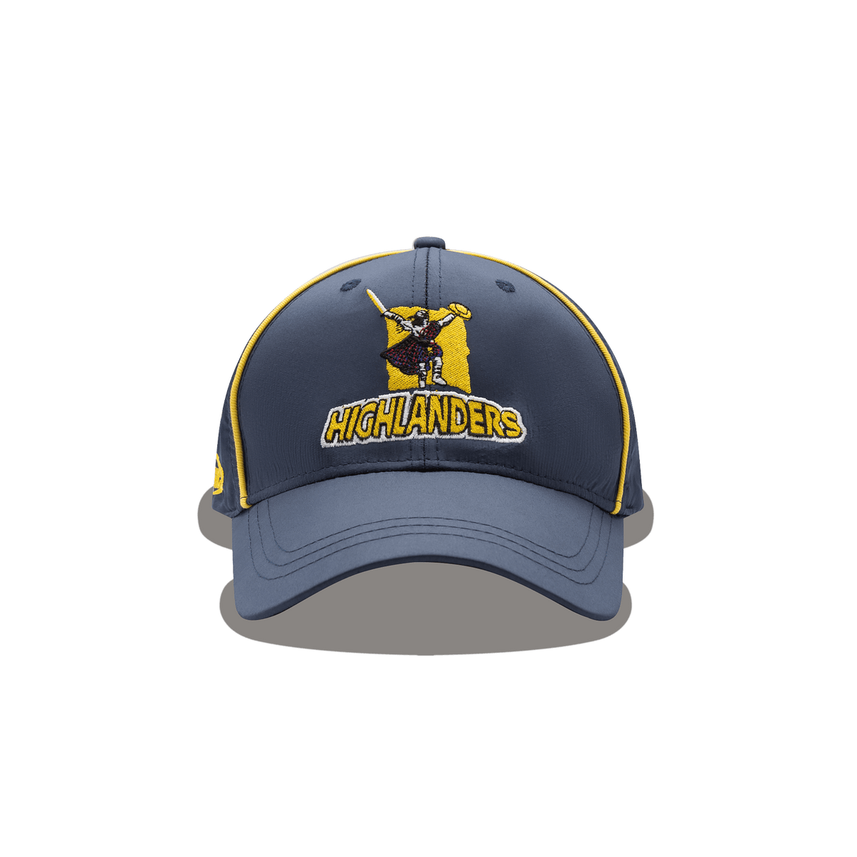 The Highlanders Super Rugby Media Cap 25/26 by Classic Sportswear features a gray design with "HIGHLANDERS" and a sword-wielding figure logo. Stylish yellow detailing on the edges embodies the spirit of Highlanders Super Rugby in this classic sportswear piece.