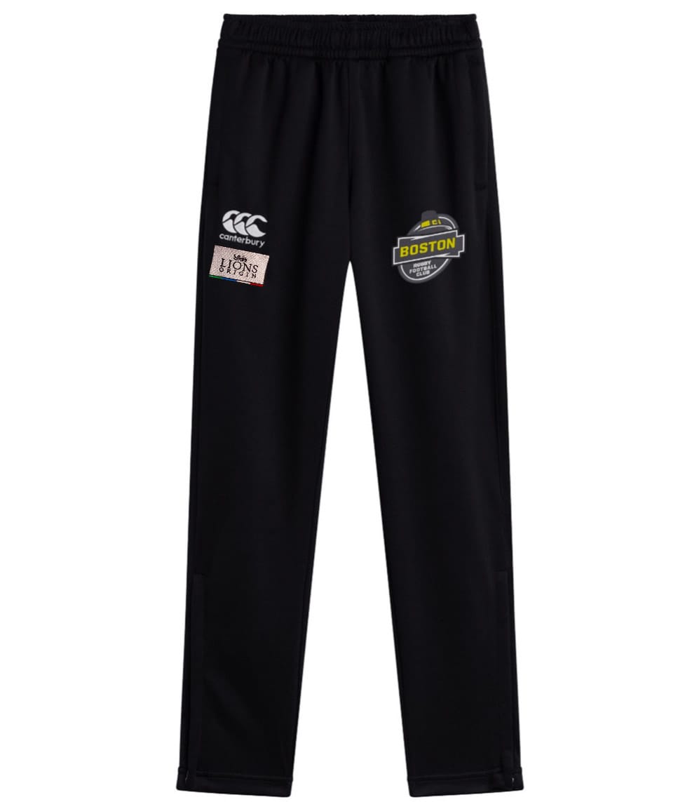 The EMB Canterbury Boston RFC Lions Origin Stretch Tapered Pant features an elastic waistband, with Canterbury, Boston, and British & Irish Lions logos on the thighs for a comfortable athletic fit.