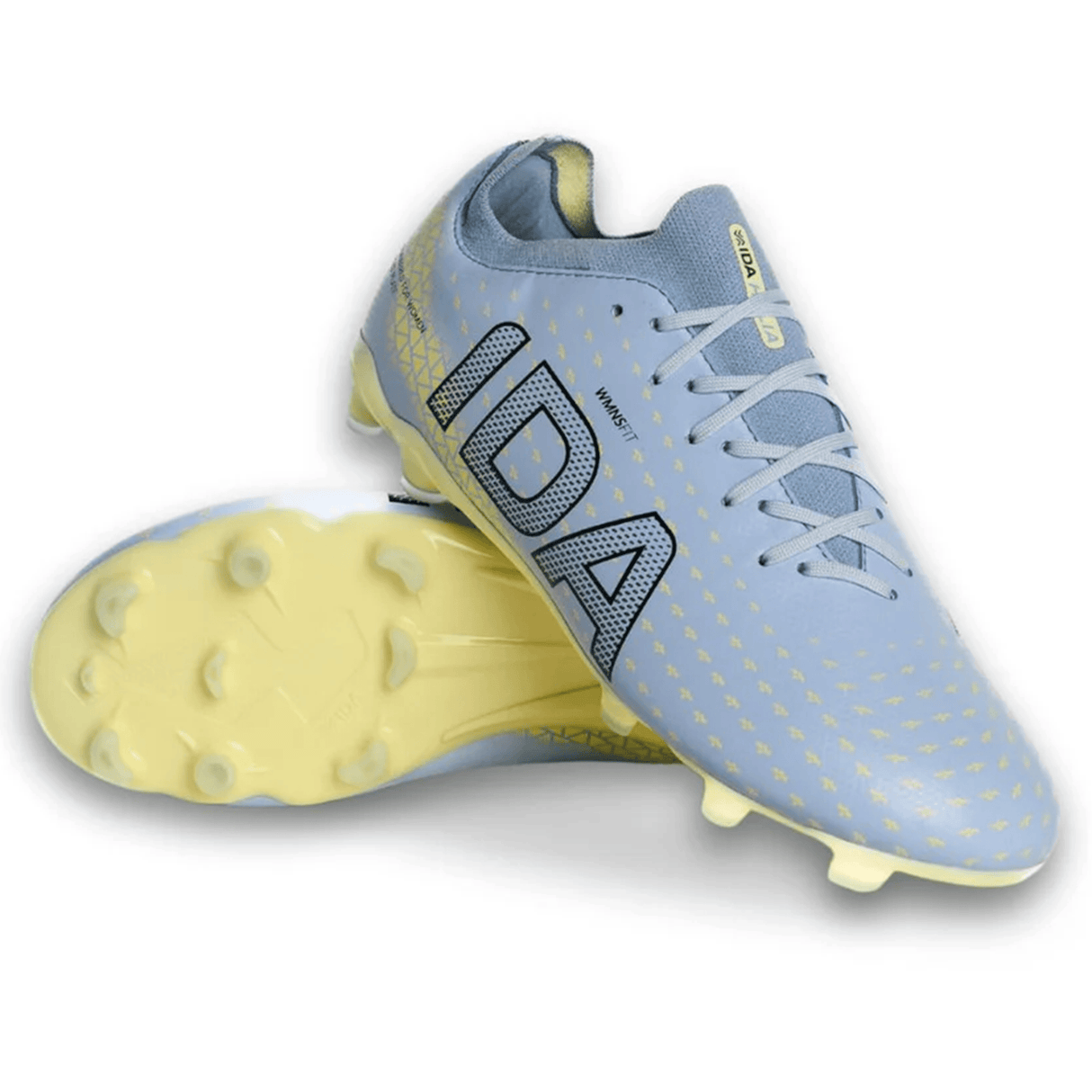 The IDA Helia Club FG - Light Blue by IDA Sports features a light blue and pale yellow design with bold "IDA" branding, lace-up closure, and molded studs—ideal firm ground soccer cleats for aspiring female athletes.