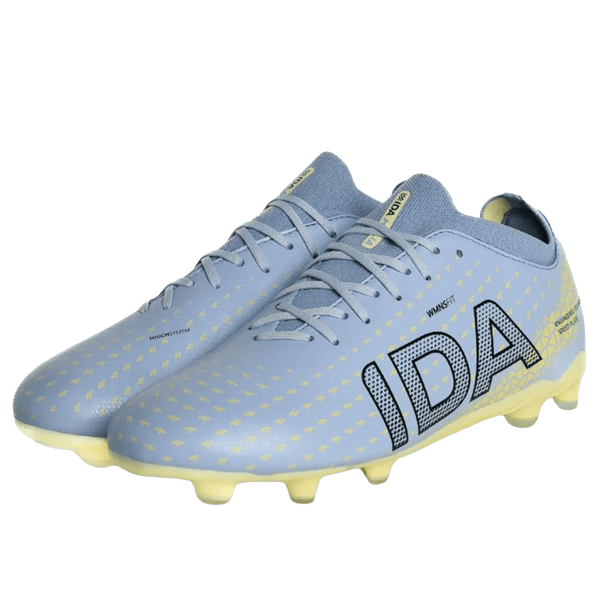 The IDA Helia Club FG by IDA Sports is a pair of light blue women's soccer cleats with yellow accents, bold black branding on the side, and yellow studs—perfect firm ground boots for style and performance.