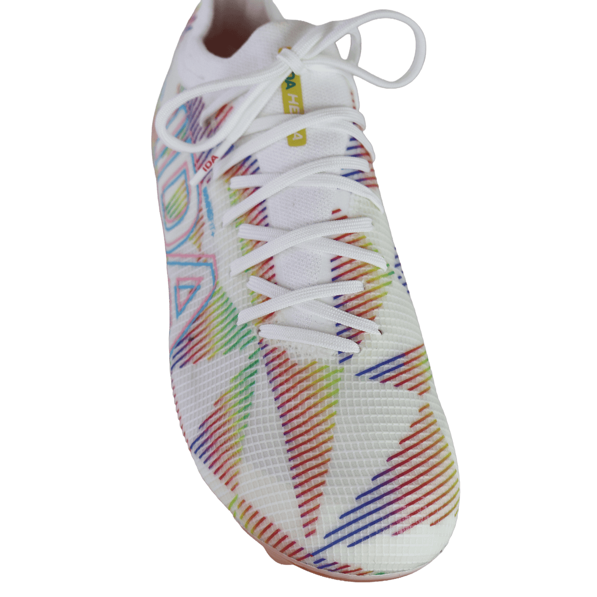 The IDA Sports Helia Elite Limited Edition Pride FG is a white firm ground shoe inspired by women’s soccer cleats, featuring colorful diagonal lines, geometric patterns, white laces, and a yellow tongue label.
