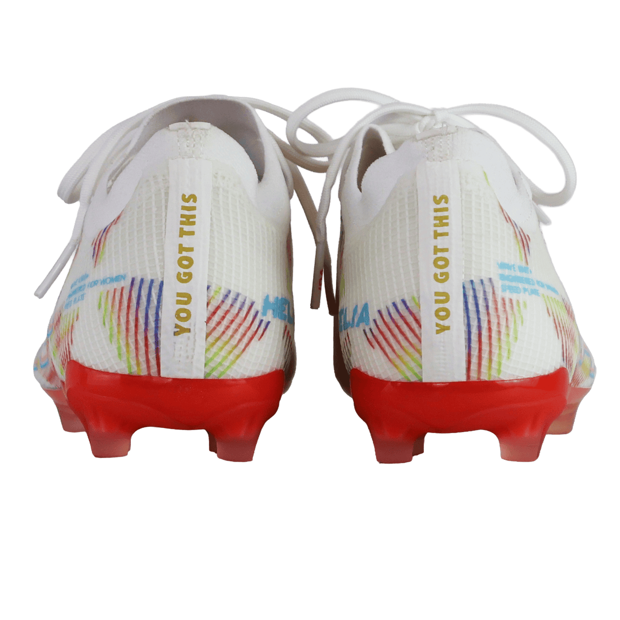 Back view of two IDA Sports Helia Elite Limited Edition Pride FG women’s soccer cleats, featuring red firm ground soles, rainbow accents, and "YOU GOT THIS" on the heel tabs.