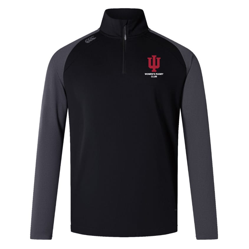 The EMB Canterbury Indiana University Women’s Elite First Layer is a black and dark gray quarter-zip pullover with the IU Women’s Rugby Club logo on the left chest and a small logo on the right shoulder.