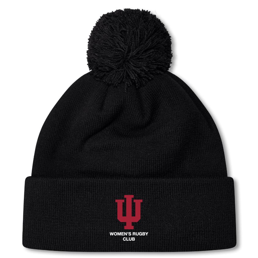The EMB Canterbury Indiana University Women Pom Pom Beanie features a black knit design, fleece lining, a red IU logo, and "Women's Rugby Club" embroidered on the front cuff.