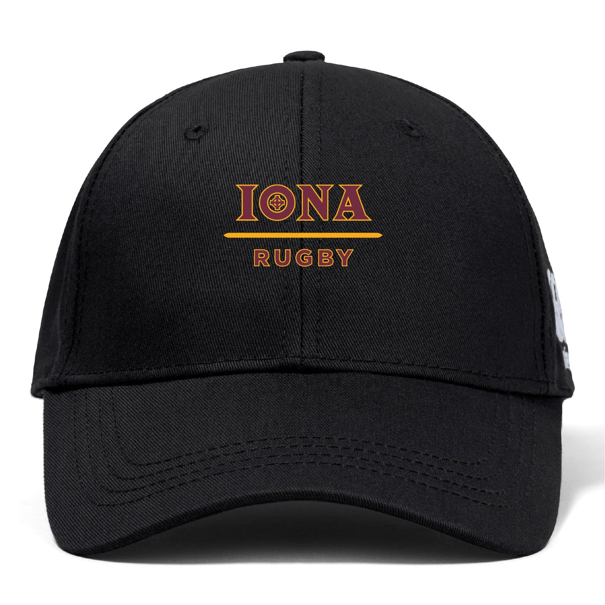The Iona College Flexfit Drill Cap by EMB Canterbury is a black cap with an embroidered "IONA RUGBY" logo in gold and red on the front.