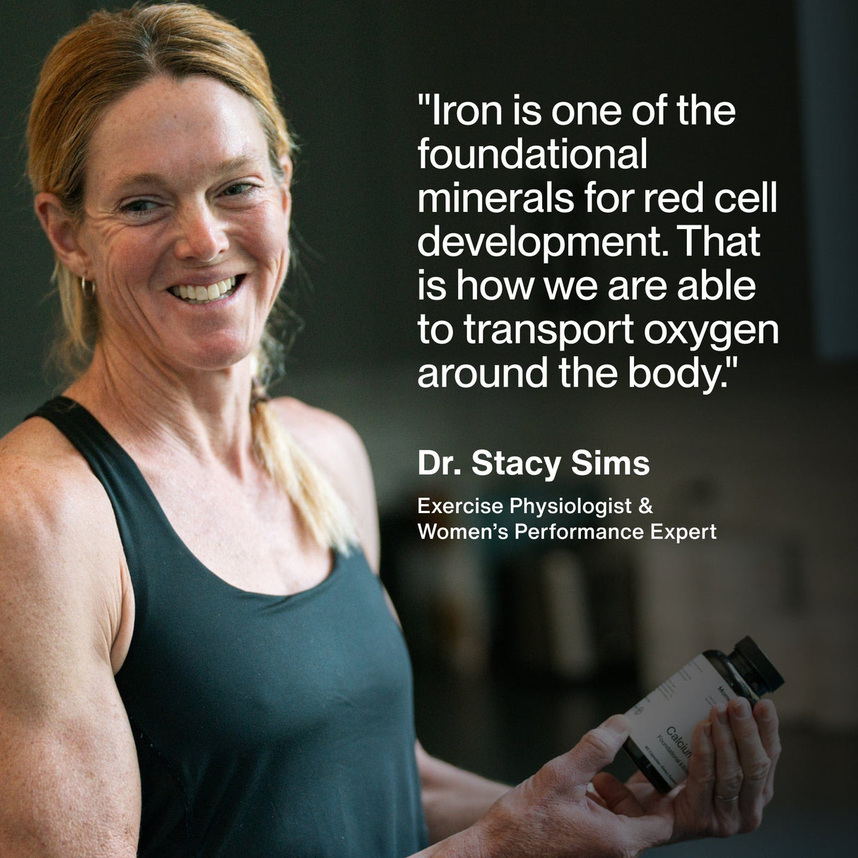 A woman in athletic wear smiles, holding a bottle of Momentous Iron+. Beside her is a quote from Dr. Stacy Sims, Exercise Physiologist, about iron’s crucial role in oxygen transport and energy support.