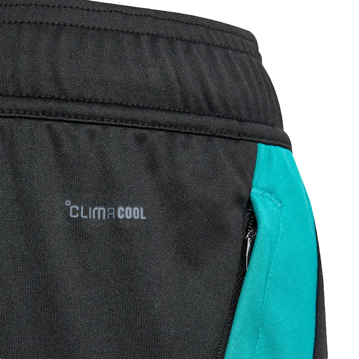 Close-up of the adidas All Blacks 25/26 Training Gym Short in black and teal, featuring a zippered pocket, Climacool technology, and inspired by iconic shorts worn by New Zealand rugby players.