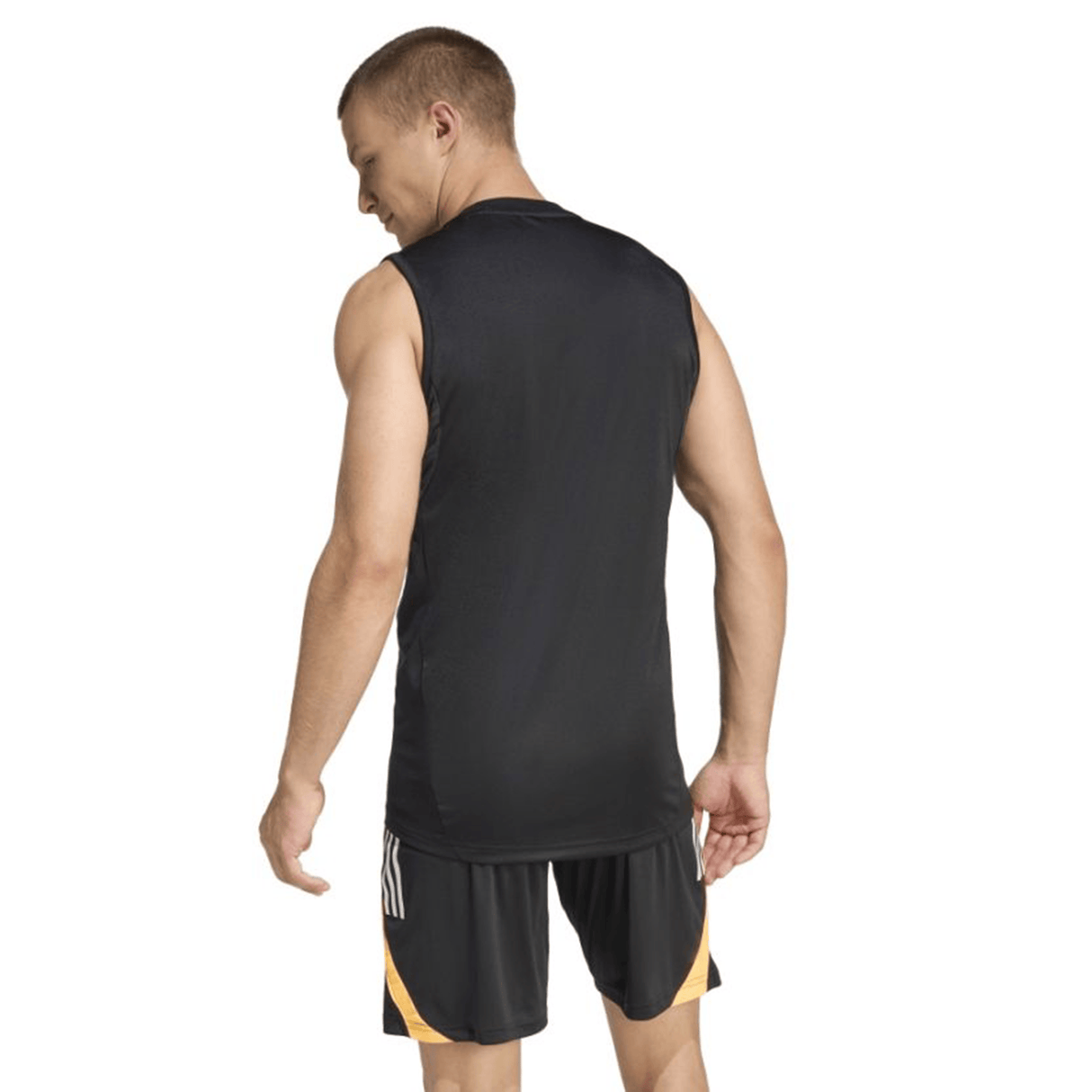 A man wearing the adidas All Blacks 26/27 Marvel Performance Training Singlet is standing and facing away from the camera.
