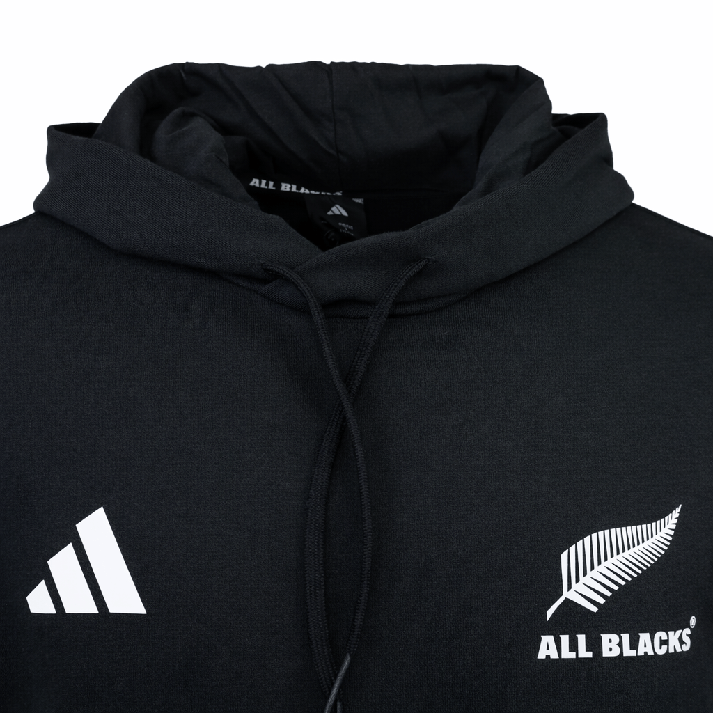The All Blacks 26/27 Marvel Hoodie by adidas is a black hoodie with the adidas logo, "All Blacks" text, and a silver fern emblem—a must-have for fans.
