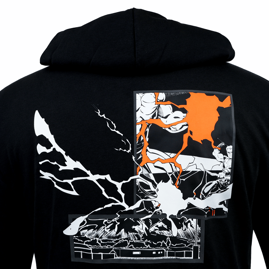 Someone wearing the adidas All Blacks 26/27 Marvel Hoodie, featuring a striking abstract graphic in white, black, and orange on the back.