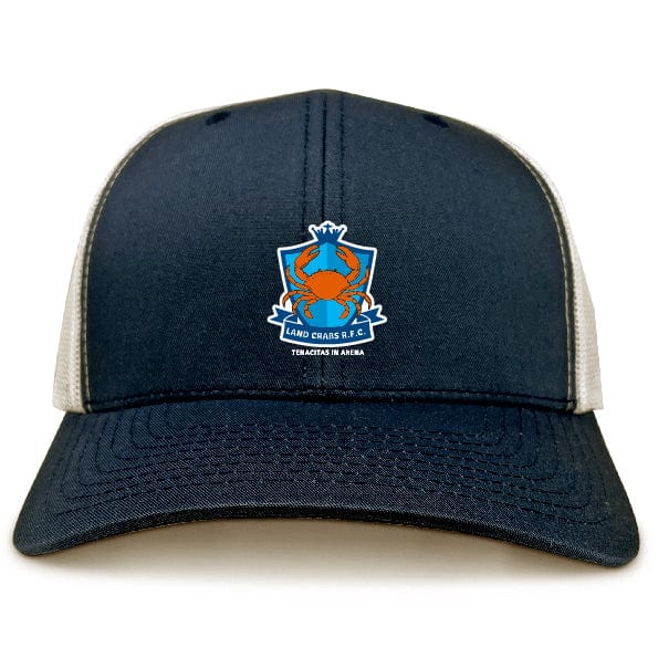 The Land Crabs RFC Retro Trucker Cap by EMB S&S Activewear features a navy and white design, embroidered crab logo, "LAND CRABS R.F.C. TOCA-ATCHA IN ARENA" text on front, and an adjustable snapback closure.