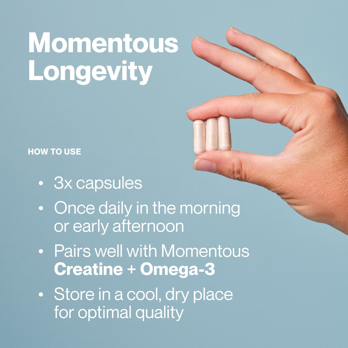 A hand holds three capsules next to text with instructions for taking Momentous Longevity by Momentous, a supplement formulated to support cellular health and overall wellness.