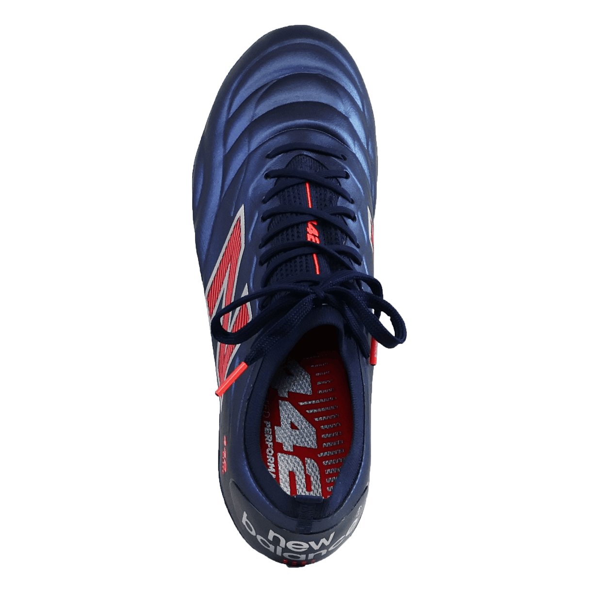The New Balance 442 v2 Elite FG in Navy/Energy Red is seen from above, highlighting its laces, tongue, premium leather upper, and partial interior branding.