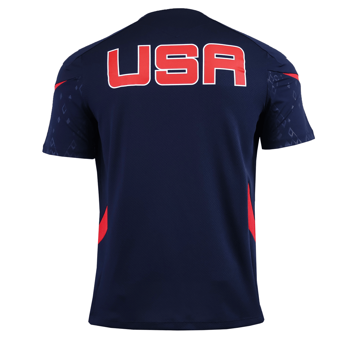 The USA Rugby 25/26 Training Poly Shirt by Macron is navy blue with "USA" in bold red and white on the back, red accents on the sides and sleeves, and made from breathable Poly Dry fabric.