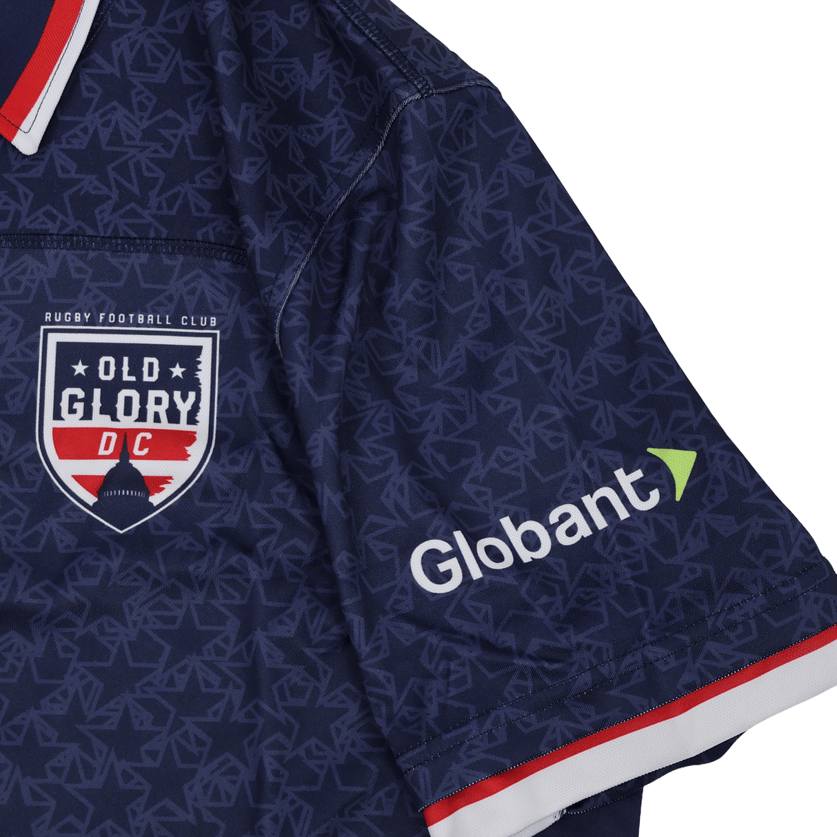 The Old Glory DC MLR 25/26 Replica Home Jersey by Macron is a navy blue rugby jersey with the team logo on the chest and the Globant sponsor on the sleeve—ideal for any MLR fan.
