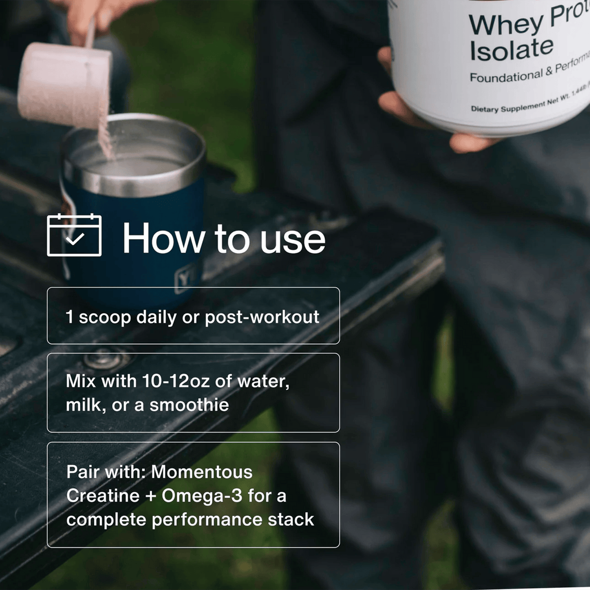 A person scoops Momentous Grass Fed Whey - Vanilla into a metal cup outdoors, with usage instructions shown—ideal for anyone prioritizing post-workout protein recovery. Each tub offers 25 servings from the trusted Momentous brand.