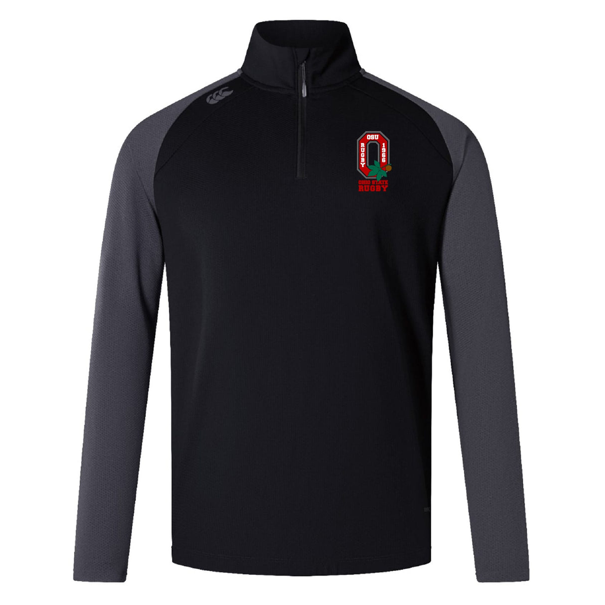 The EMB Canterbury Ohio State University Alumni Elite First Layer is a black and dark gray long-sleeve quarter-zip top with a red, green, and white rugby emblem on the left chest, right shoulder logo, and VapoDri tech for comfort.