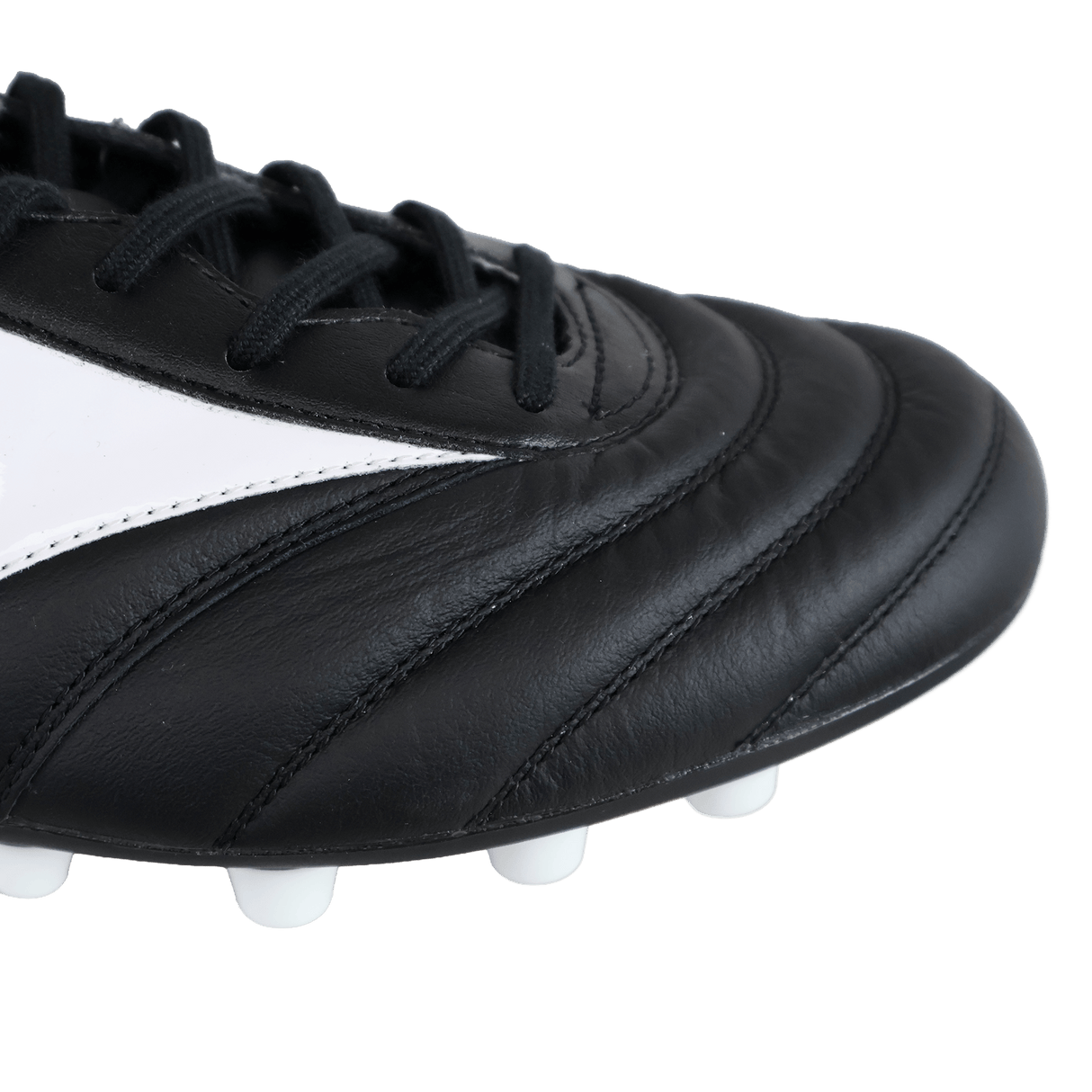 Close-up of the toe and laces of a black, white, and red Mizuno Morelia II Elite AG soccer cleat, highlighting kangaroo leather stitching detail and white sole studs.